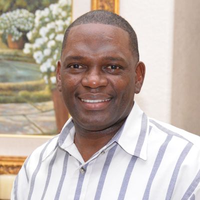 Dr. Garth Dalwin Hutton